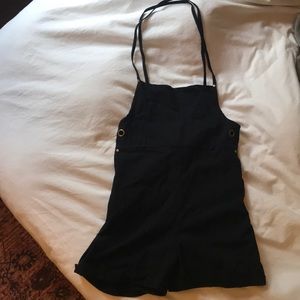 BLACK CRISS CROSS ROMPER